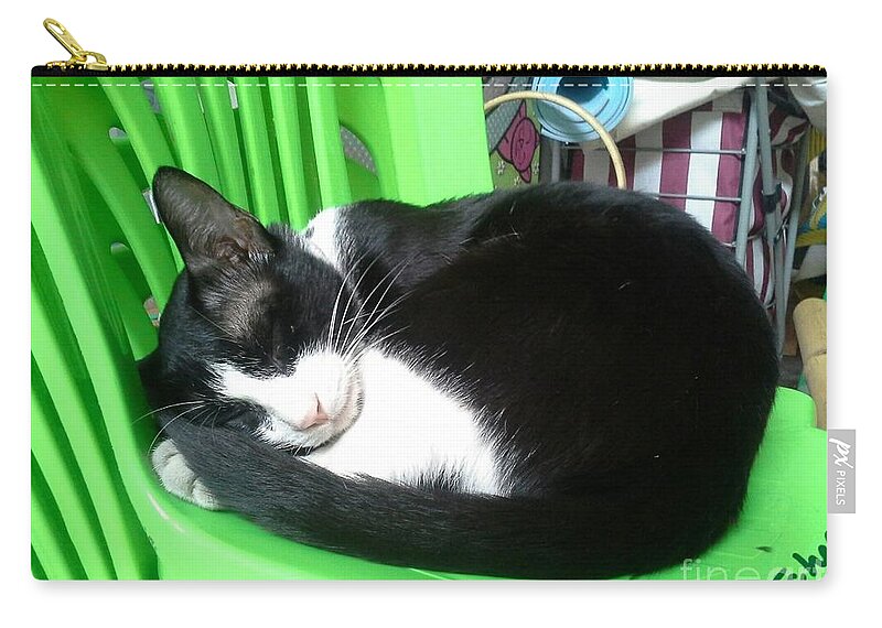 Green Zip Pouch featuring the photograph Green Chair Sleeping by Sukalya Chearanantana