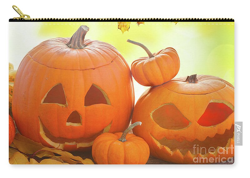 Pumpkin Zip Pouch featuring the photograph Halloween pumpkins by Anastasy Yarmolovich