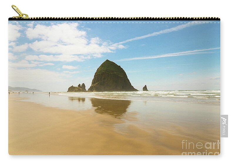Haystack Rock Zip Pouch featuring the photograph Haystack Rock by Veronica Batterson