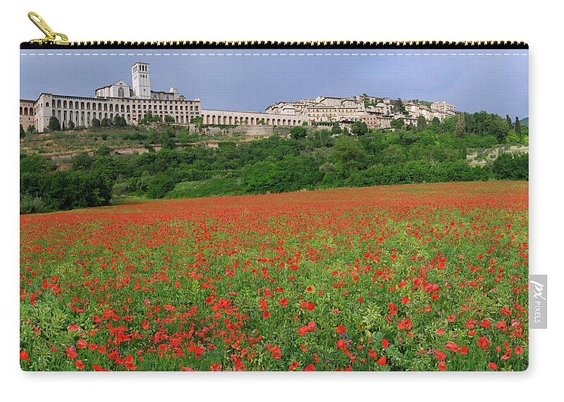 Farm Zip Pouch featuring the photograph Hilltop city of Assisi with wildflower poppies in Umbria Italy by Reimar Gaertner