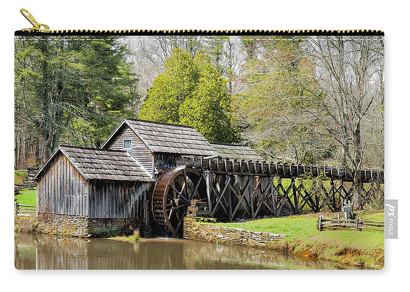 Landscape Zip Pouch featuring the photograph Historic Mabry Mill in Early Spring by Betty Denise
