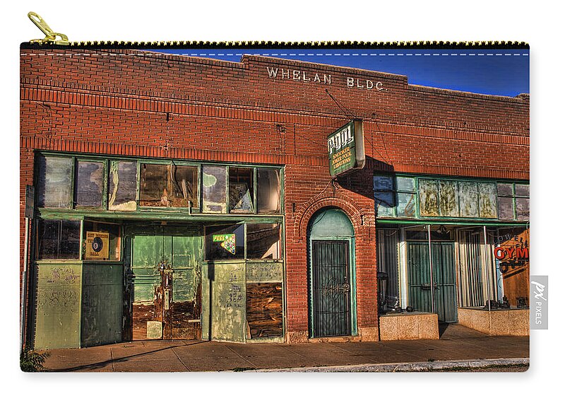 Lowell Zip Pouch featuring the photograph Historic Storefront in Bisbee by Charlene Mitchell