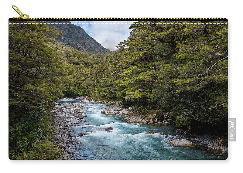 Joan Carroll Zip Pouch featuring the photograph Hollyford River New Zealand by Joan Carroll