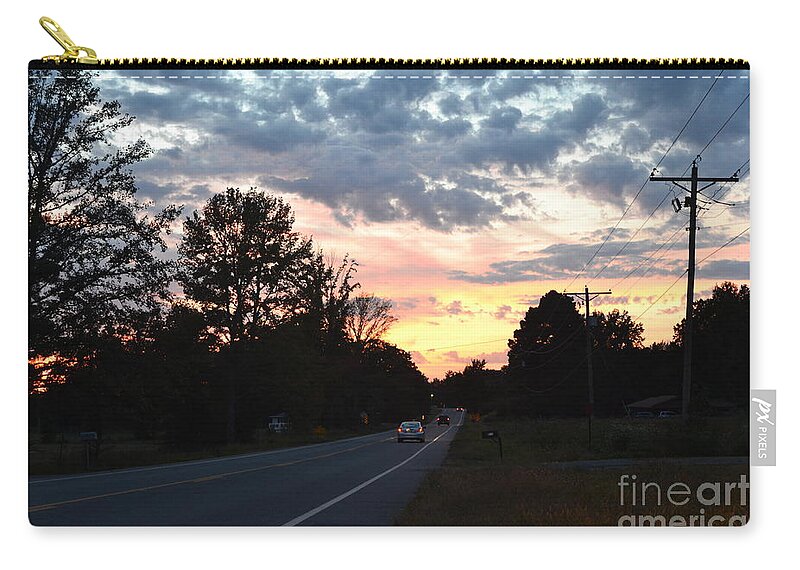 Homeward Bound Evening Sky Zip Pouch featuring the photograph Homeward Bound Evening Sky by Karen Francis
