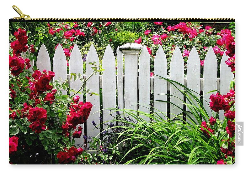 Red Roses Zip Pouch featuring the photograph In A Summer Rose Garden by Angela Davies