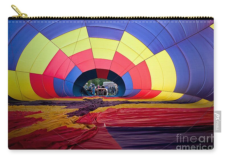 Activity Zip Pouch featuring the photograph Inflating Hot Air Balloon by Bryan Mullennix