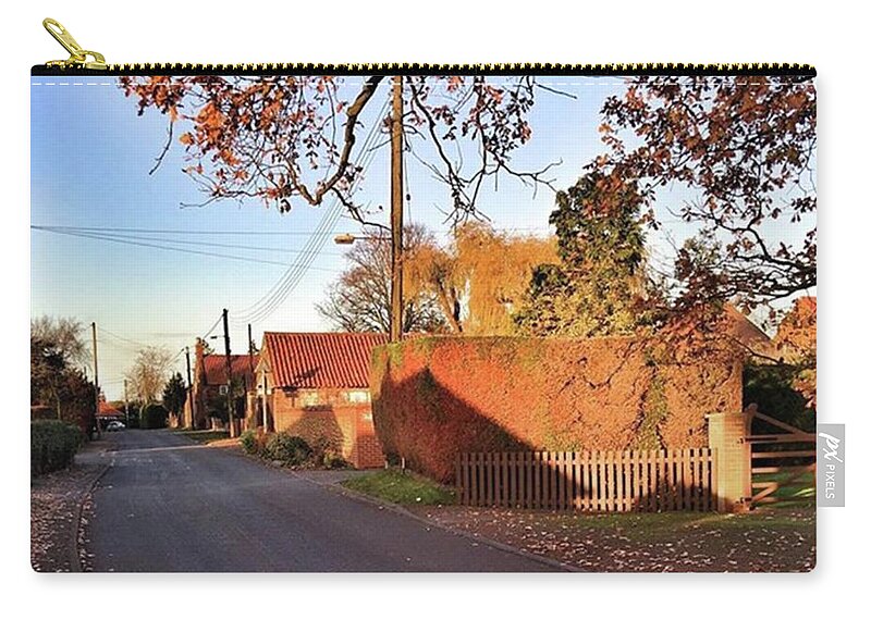 Kingslynn Zip Pouch featuring the photograph It Looks Like We've Found Our New Home by John Edwards