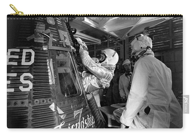 John Glenn Zip Pouch featuring the photograph John Glenn Entering Friendship 7 Spacecraft by War Is Hell Store