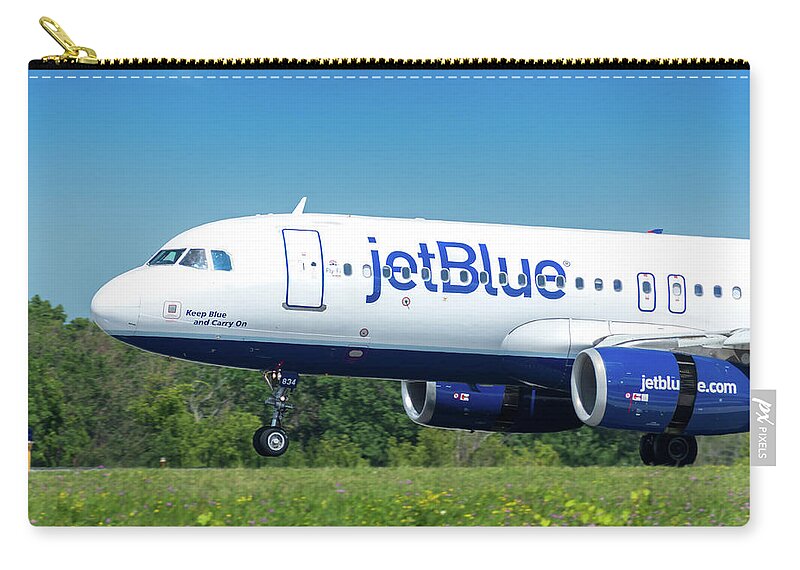 Air Travel Zip Pouch featuring the photograph Keep Blue And Carry On by Guy Whiteley