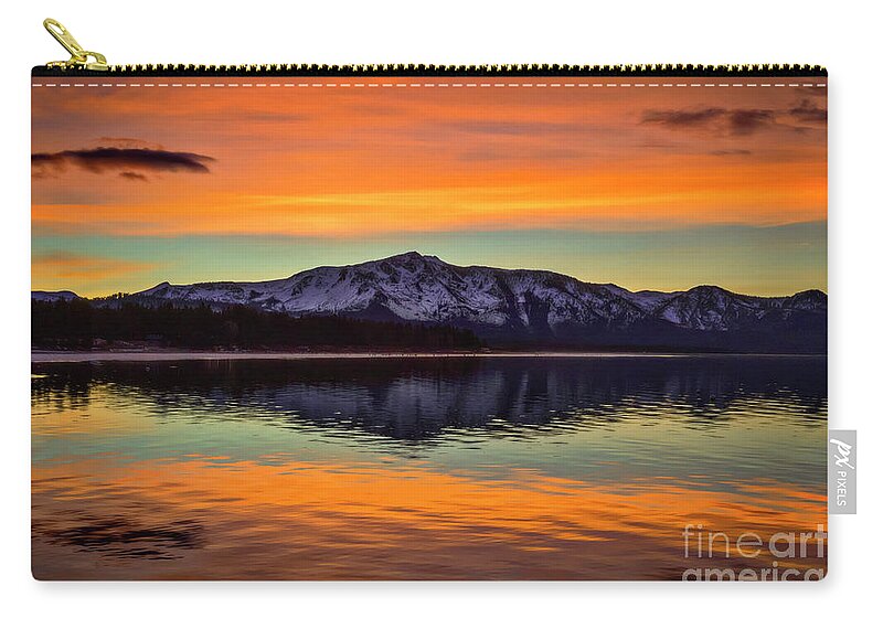 Lake Tahoe Glow Zip Pouch featuring the photograph Lake Tahoe Glow by Mitch Shindelbower