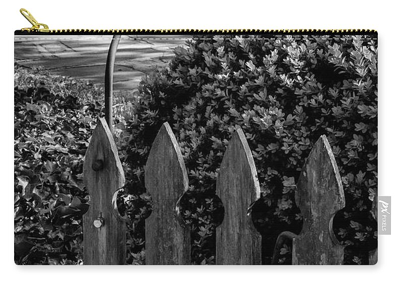 Roanoke Zip Pouch featuring the photograph Lamp and Gate 2 by Bob Phillips