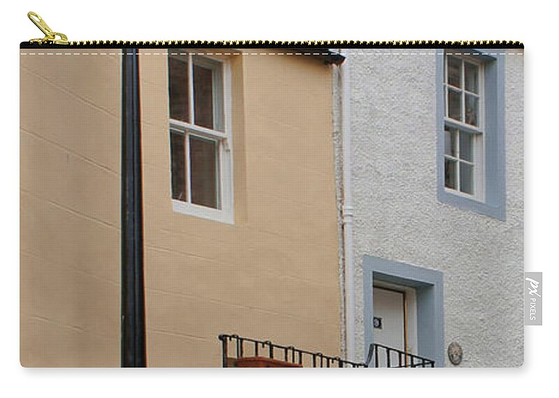 Lamppost Zip Pouch featuring the photograph Lamppost on narrow street by Elena Perelman