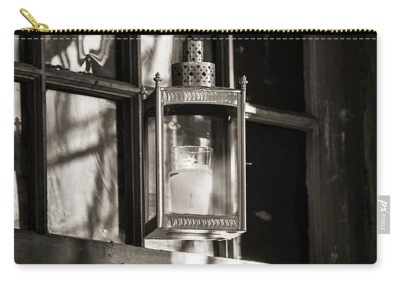 Lantern Zip Pouch featuring the photograph Lantern in a window 2 by Jason Hughes