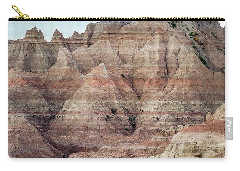 Badlands Zip Pouch featuring the photograph Layer Upon Layer by Karen Jorstad