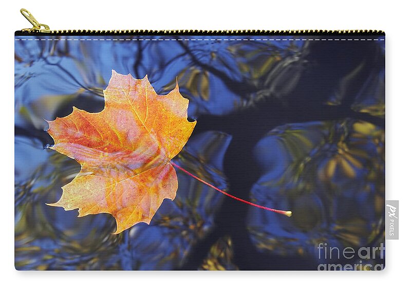 Leaf Zip Pouch featuring the photograph Leaf On The Water by Michal Boubin