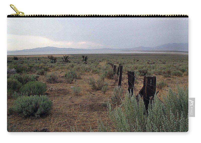Nevada Zip Pouch featuring the photograph Leaving Reno by DArcy Evans