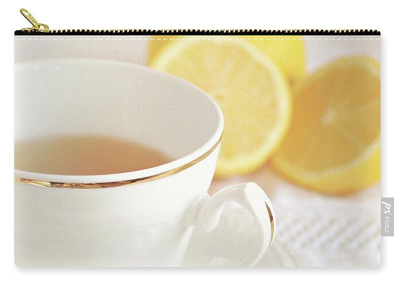 Lemons Zip Pouch featuring the photograph Lemon Tea by Lyn Randle