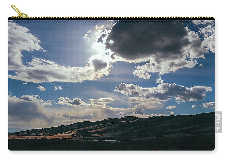 Canon 7d Mark Ii Zip Pouch featuring the photograph Light in the Distance by Dennis Dempsie