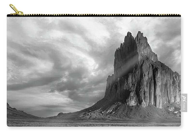 New Mexico Zip Pouch featuring the photograph Light on Shiprock by Jon Glaser