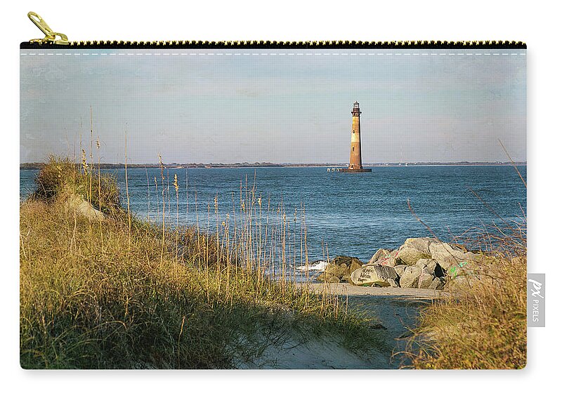 Morris Island Lighthouse Zip Pouch featuring the photograph Lighthouse from beach at Dusk by Patricia Schaefer