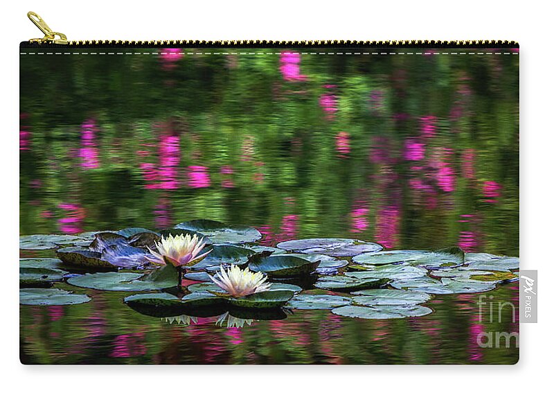Gibbs Gardens Zip Pouch featuring the photograph Lilies And Crape Myrtle by Doug Sturgess