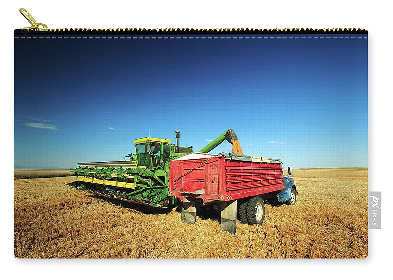 Combine Zip Pouch featuring the photograph Load of Wheat by Todd Klassy