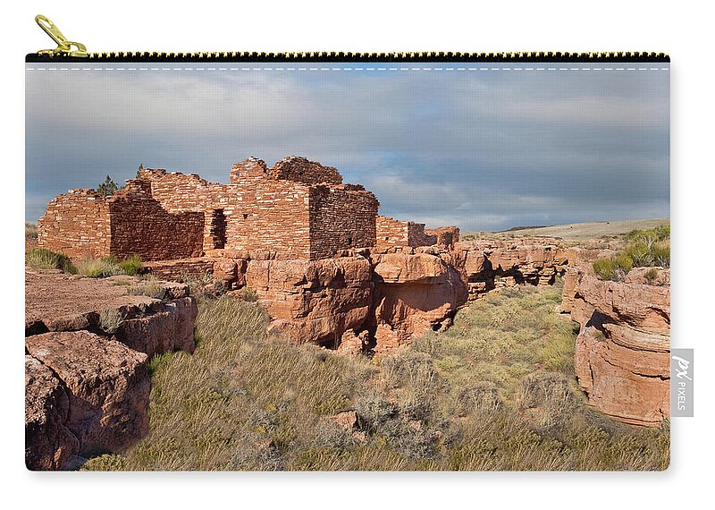 Adobe Zip Pouch featuring the photograph Lomaki Pueblo Ruins by Jeff Goulden