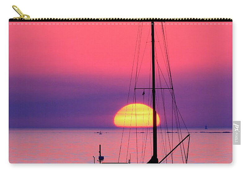 Yacht Zip Pouch featuring the photograph Lonely sunset by Bernardo Galmarini
