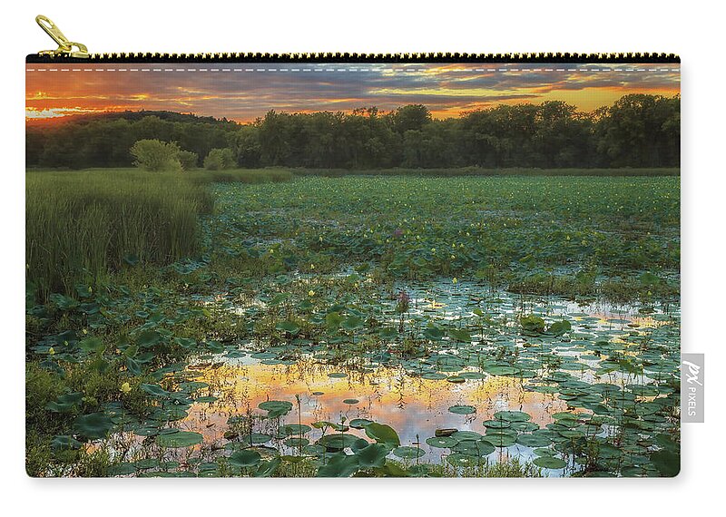 Concord Zip Pouch featuring the photograph Lotus Sunset Water by Sylvia J Zarco