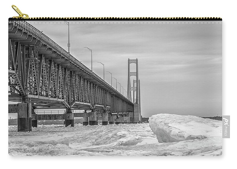 John Mcgraw Zip Pouch featuring the photograph Mackinac Bridge Icy Black and White by John McGraw