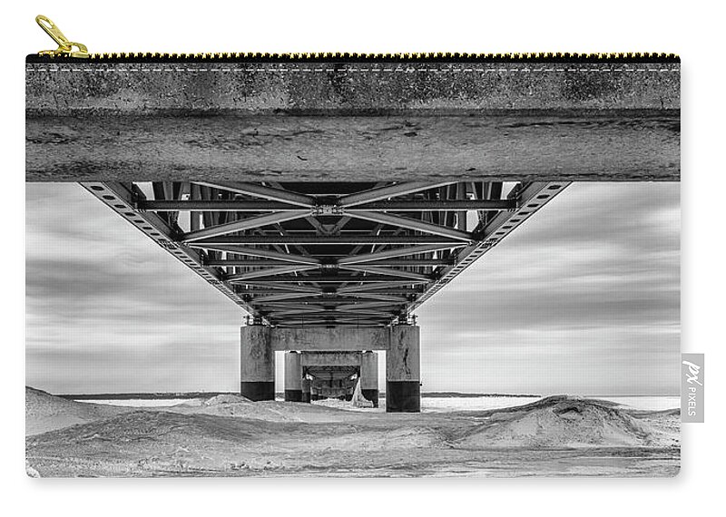 John Mcgraw Zip Pouch featuring the photograph Mackinac Bridge in Winter Underneath by John McGraw