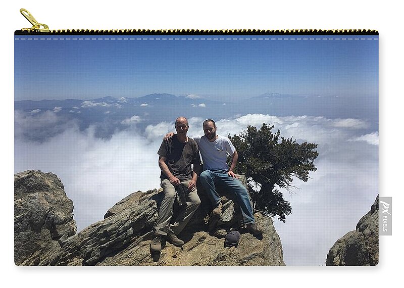 View Zip Pouch featuring the photograph Made It To The Top by Ed Clark