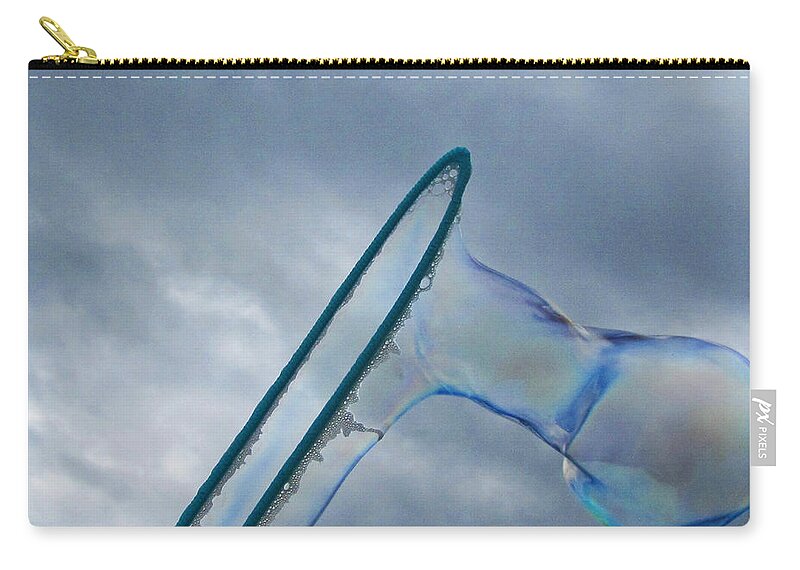 Photograph Zip Pouch featuring the photograph Making a bubble A by Christopher Mercer