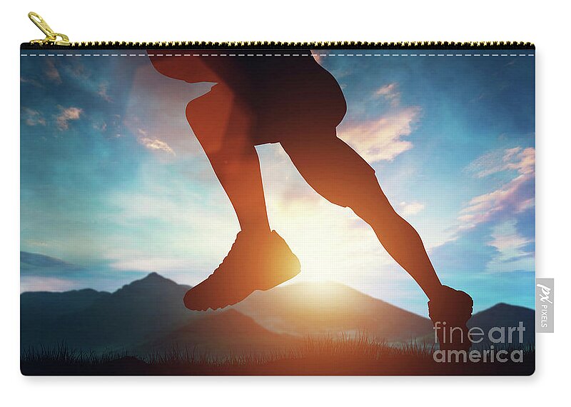 Man Zip Pouch featuring the photograph Man running in the mountains at the sunset. by Michal Bednarek