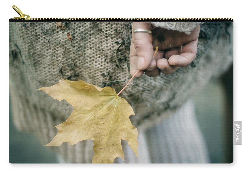 Woman Zip Pouch featuring the photograph Maple Leaf. Prickle Tenderness by Inna Mosina