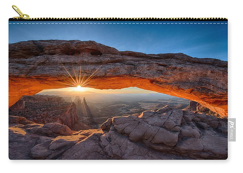 Canyonlands Carry-all Pouch featuring the photograph The Sunrise View Through the Mesa Arch by O Lena