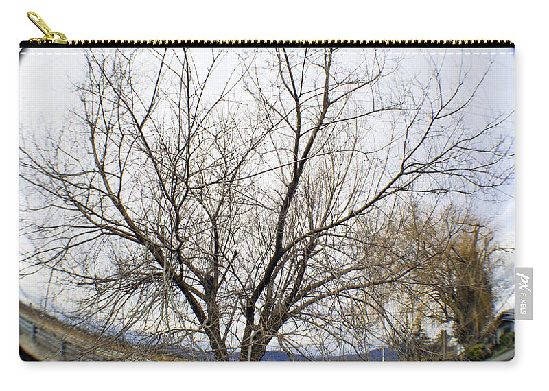 Art Zip Pouch featuring the photograph Mesmerizing Tree by Clayton Bruster
