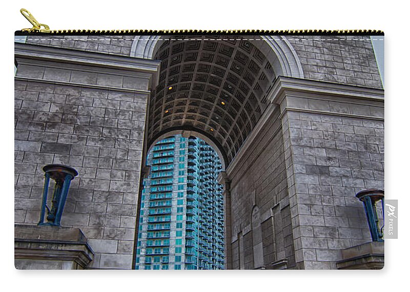 Atlanta Zip Pouch featuring the photograph Millennium Gate triumphal arch at Atlantic Station in Midtown At by Alex Grichenko