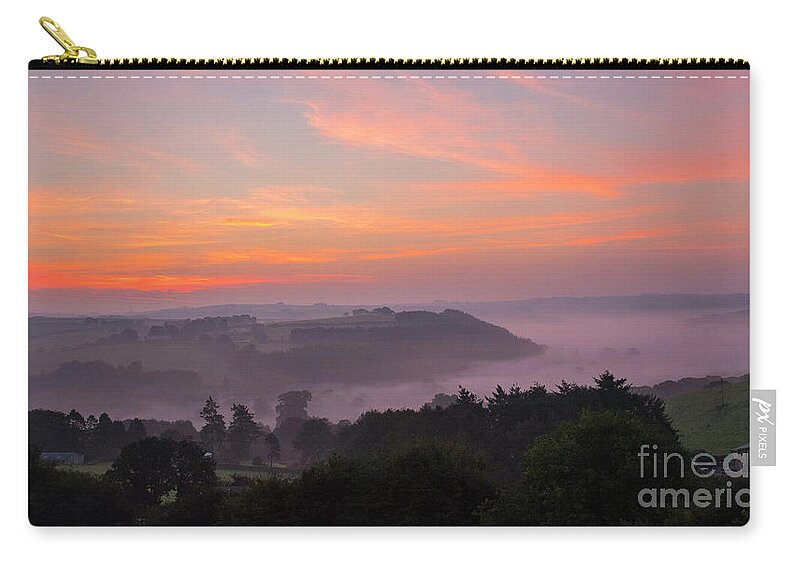 Sunrise Zip Pouch featuring the photograph Misty Sunrise by Chris Thaxter