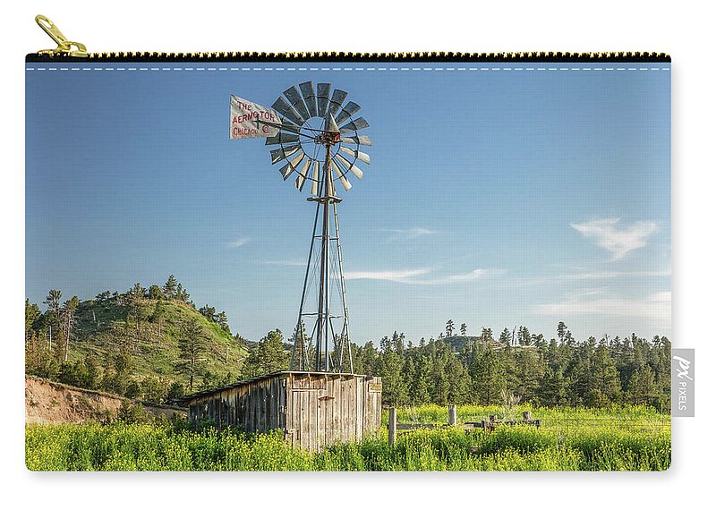Windmill Zip Pouch featuring the photograph Montana Windmill by Todd Klassy