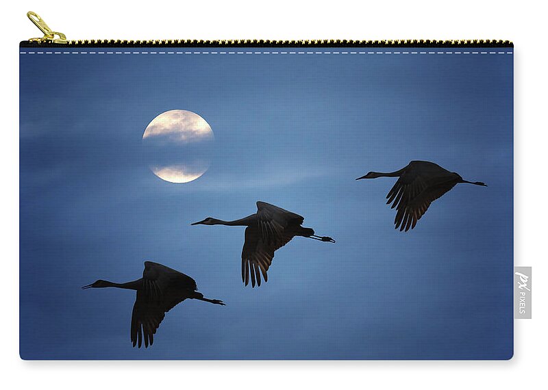 Sandhill Crane Carry-all Pouch featuring the photograph Moonlit Flight by Susan Rissi Tregoning