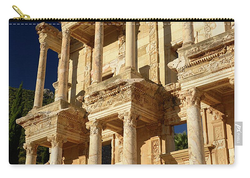 Morning Zip Pouch featuring the photograph Morning sun on ornate facade of the Library and Mausoleum of Cel by Reimar Gaertner
