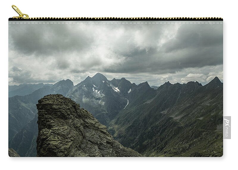 Mountain Zip Pouch featuring the photograph Mountain peacks panorama by Nicola Aristolao