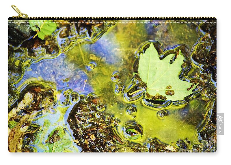 Landscape Zip Pouch featuring the photograph Mud puddle by Merle Grenz