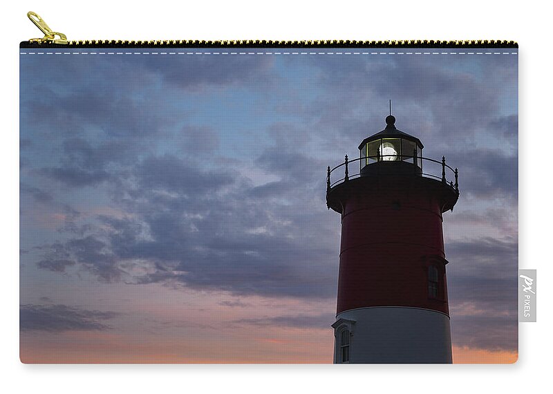 Blue Hour Zip Pouch featuring the photograph Nauset Light lighthouse at sunset by Marianne Campolongo