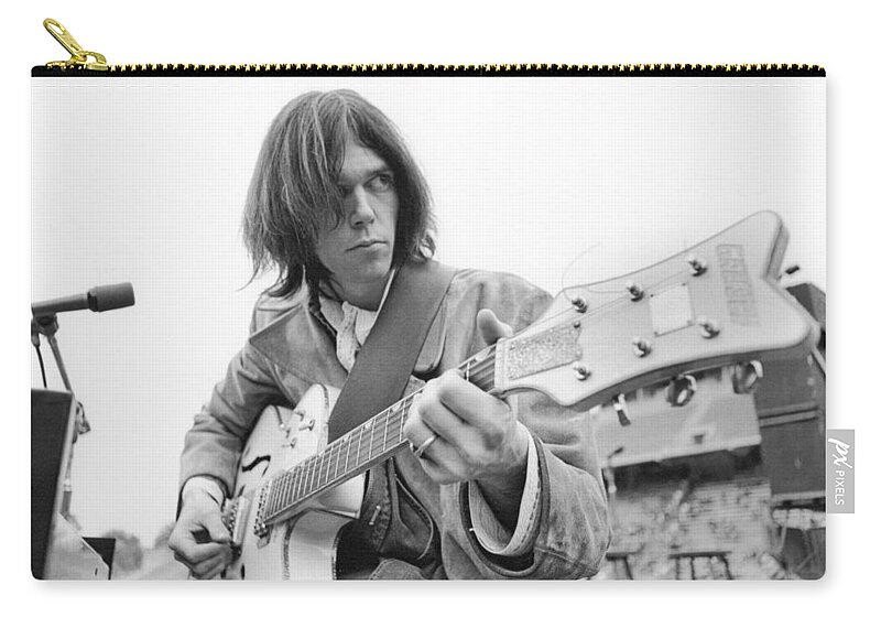 Neil Young Zip Pouch featuring the photograph Neil Young by Kenneth Summers