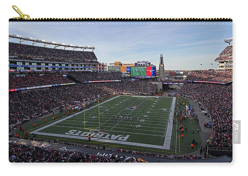 Patriots Zip Pouch featuring the photograph New England Patriots by Juergen Roth