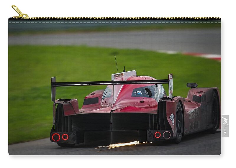 Nissan Gt-r Nismo Zip Pouch featuring the photograph Nissan GT-R Nismo by Jackie Russo