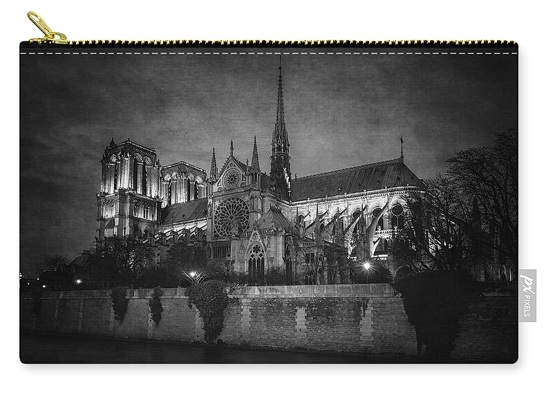 Paris Zip Pouch featuring the photograph Notre Dame on the Seine BW by Joan Carroll