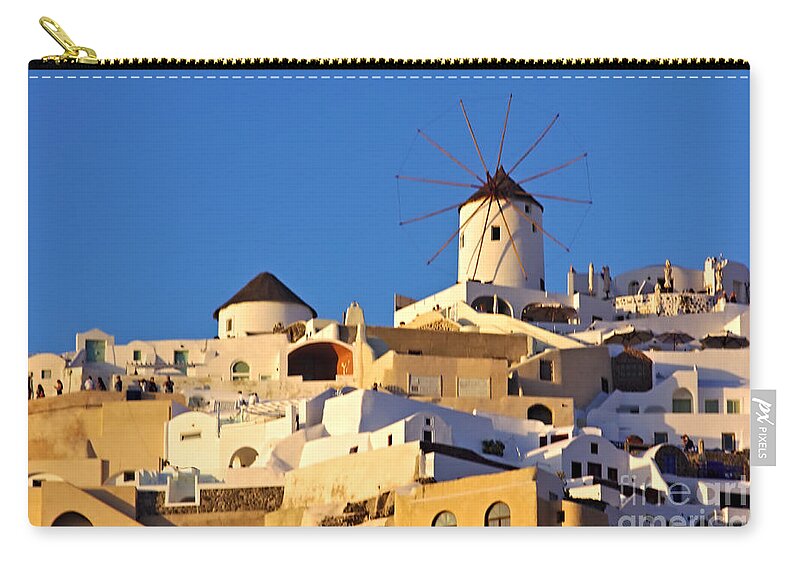 Santorini Carry-all Pouch featuring the photograph Oia Windmill by Jeremy Hayden